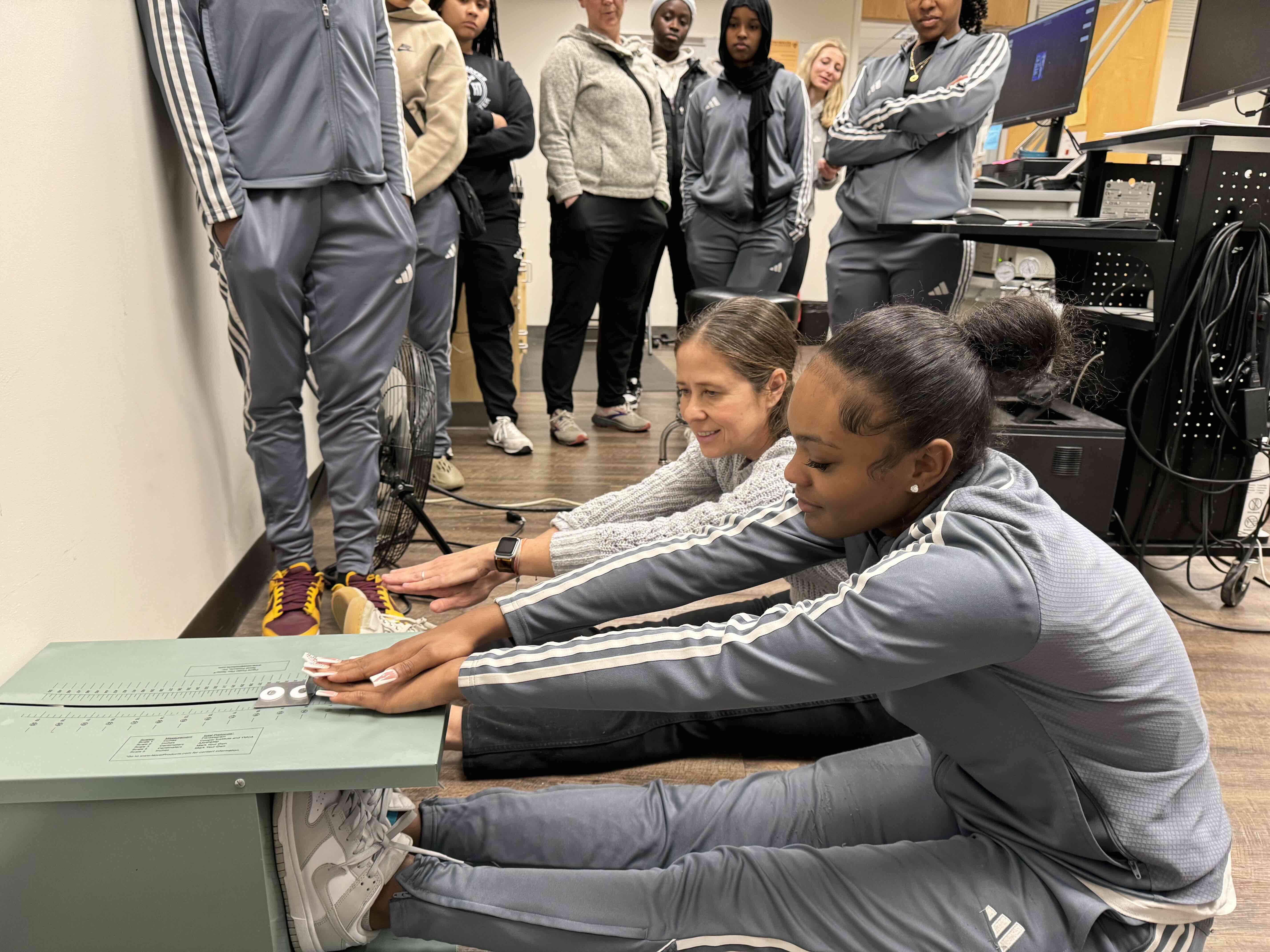 Ohio State student using machine to measure stretching ability