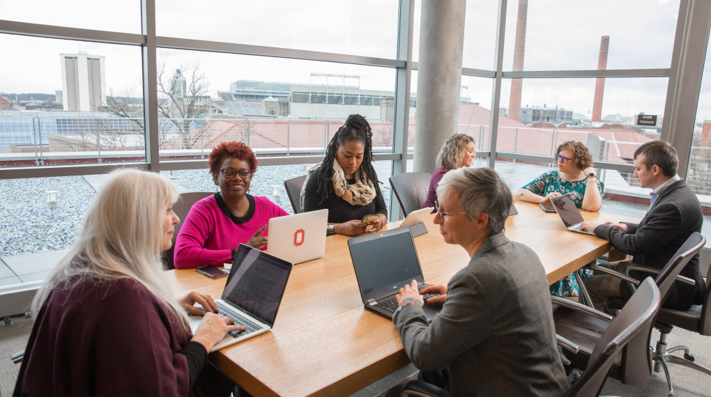 staff and faculty meeting at Thompson Library conference room