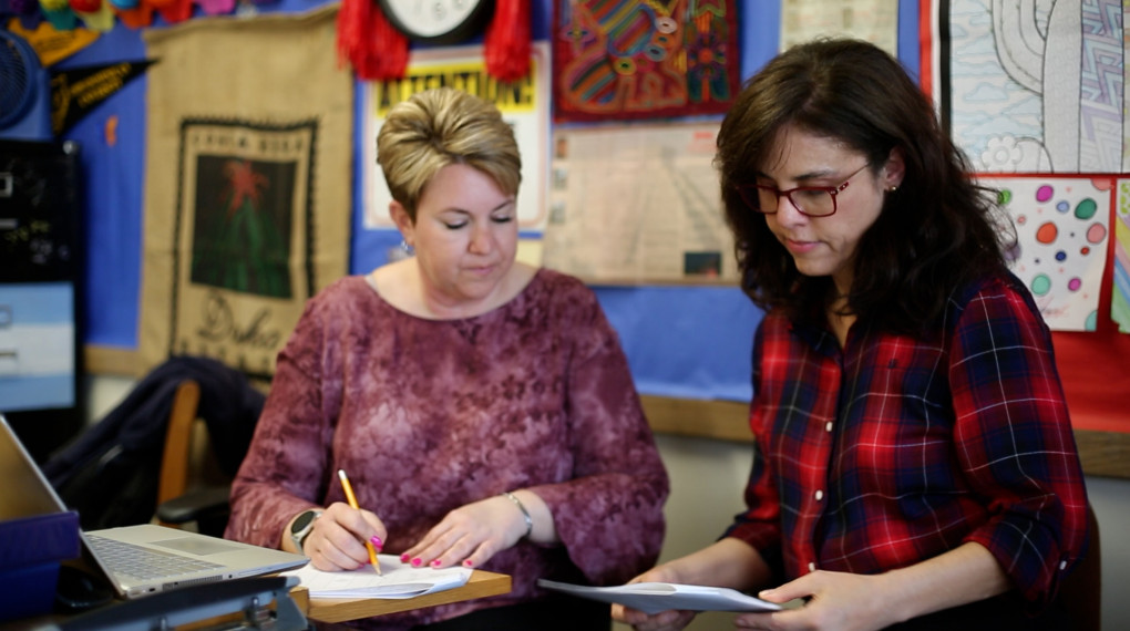 Two women sitting in a classroom