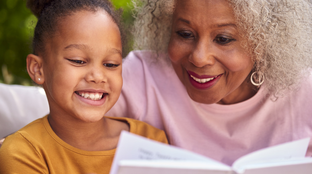 Grandmother reading with child