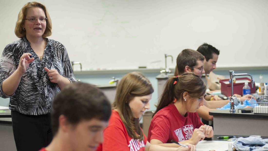 teacher in class with students
