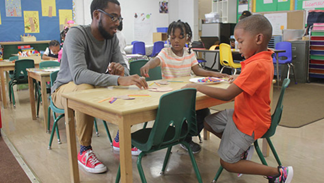 Ed Thomas with students