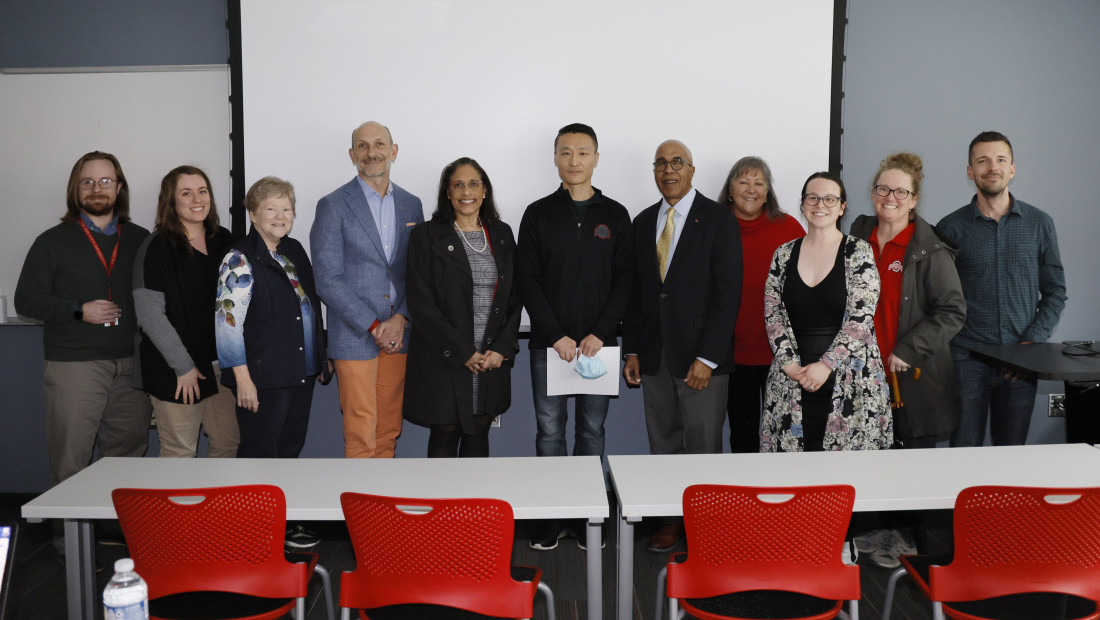Ohio State faculty Lin Ding with students in classroom