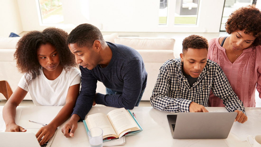 parents working with kids on homework