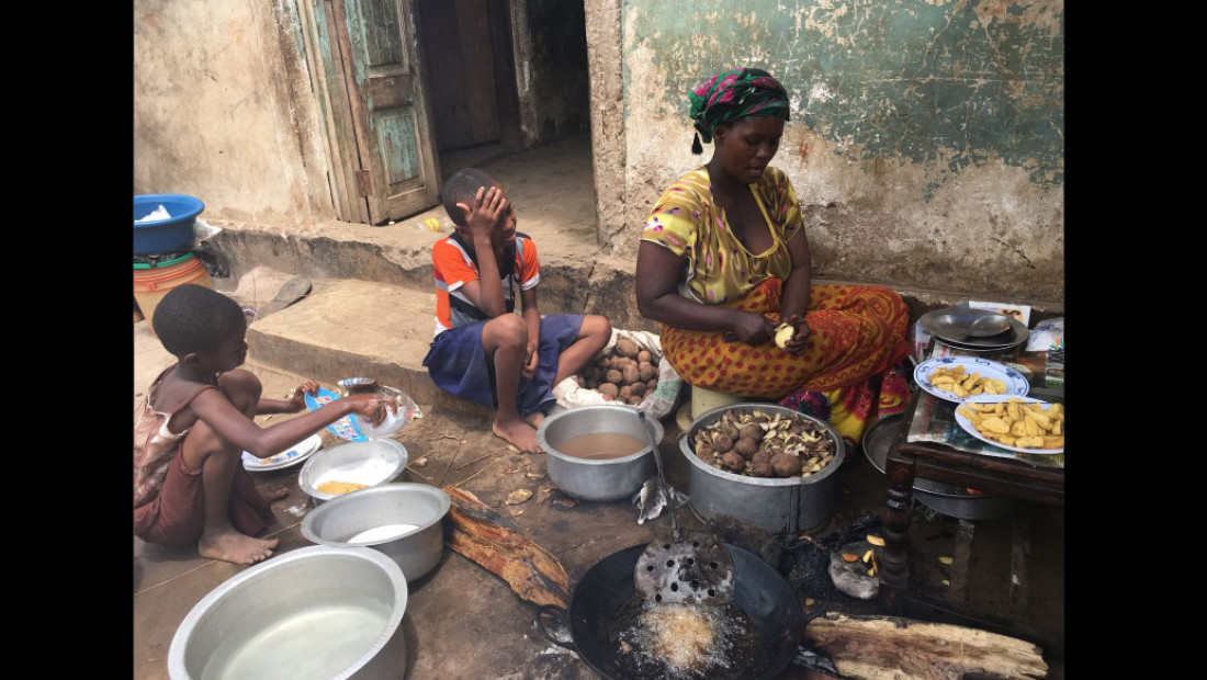 Tanzania family cooking food