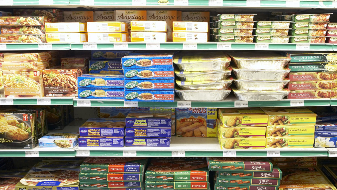 Convinience store shelves full of snack foods