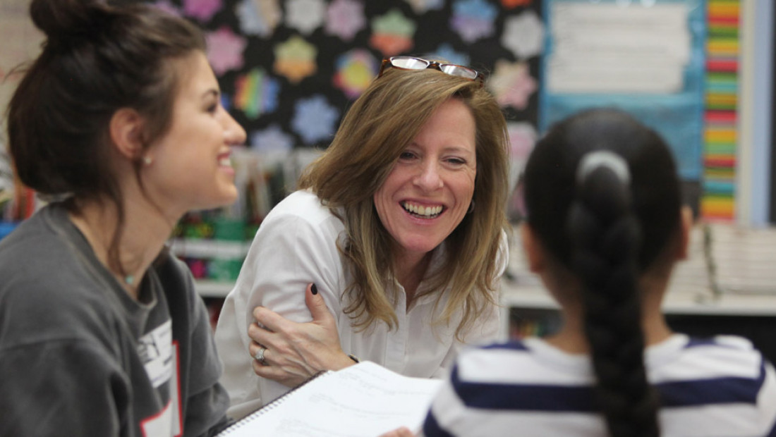 Teacher with students