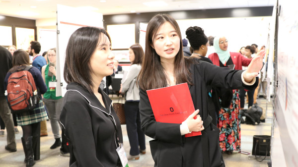 students with research poster