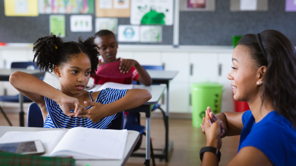 teacher and student talking