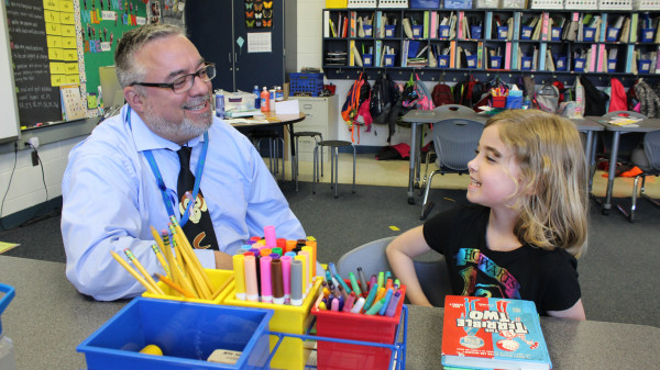 principal with student