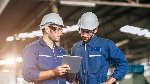 engineers on site talking about a project