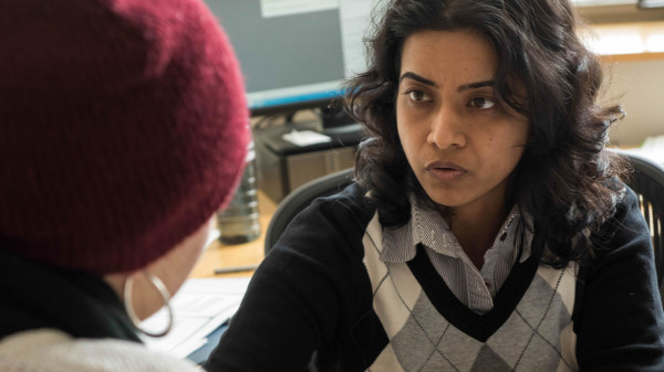 professor talking to a student