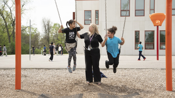 Principal with students outside