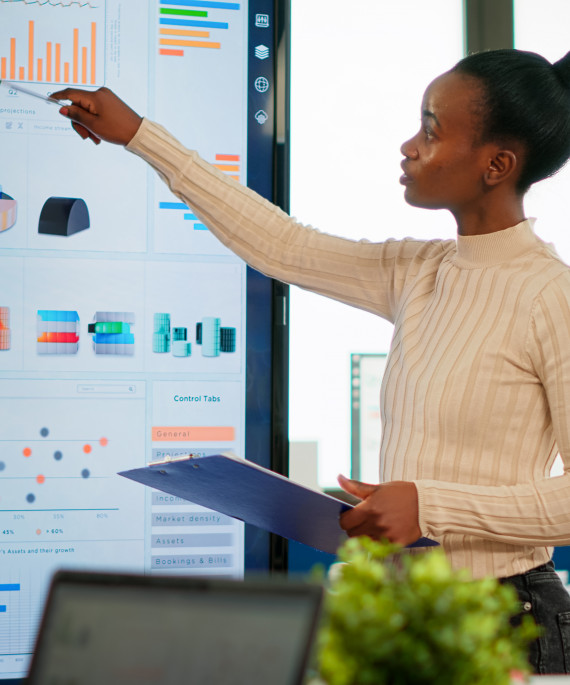 woman presenting in business training meeting