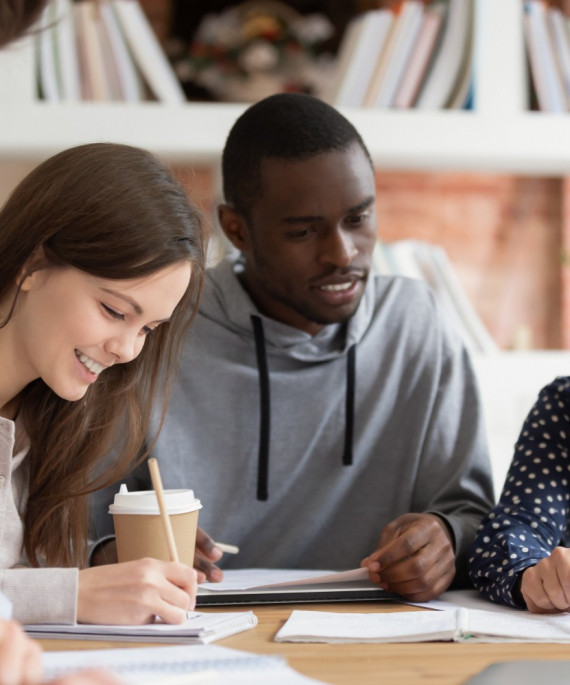 students sitting around a table studying