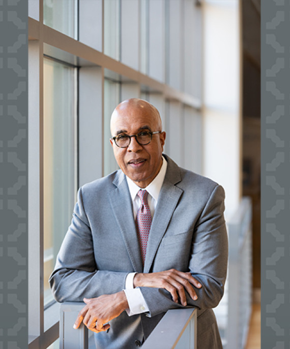 Ohio State EHE Dean Don Pope-Davis headshot on gray patterned background