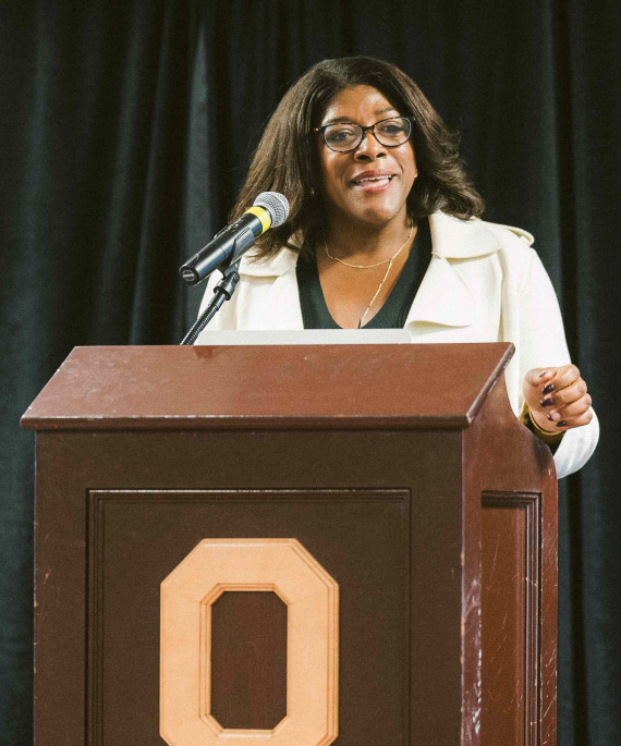 Detra Price-Dennis speaking at the Ohio State podium