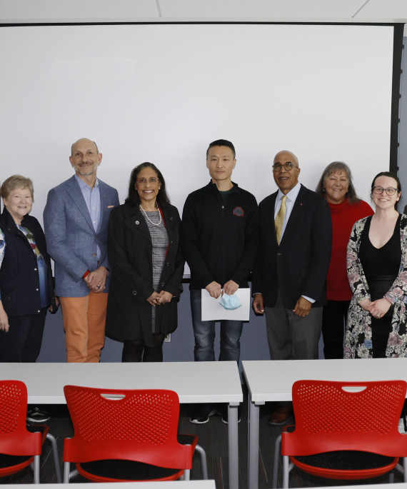 Ohio State faculty Lin Ding with students in classroom