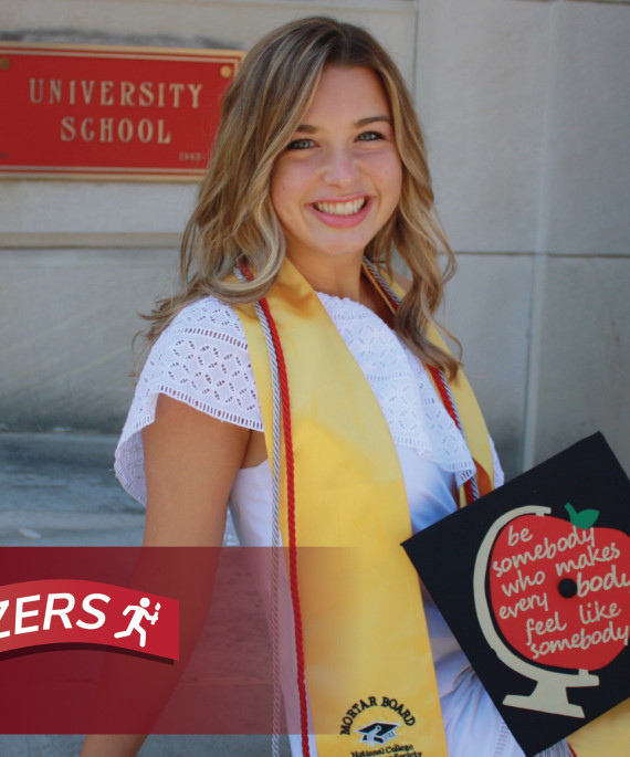 Emily Shaw posing with graduation cap with Ohio State trailblazers logo