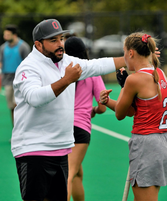 coach talking to player