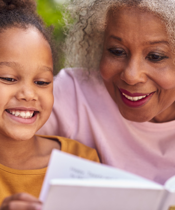 Grandmother reading with child