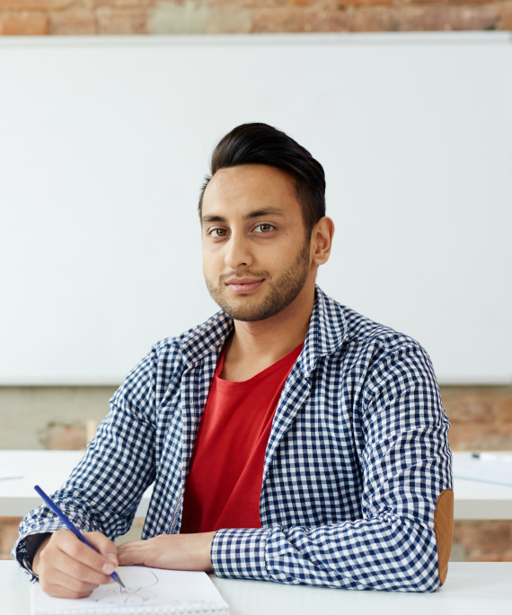 guy learning in classroom