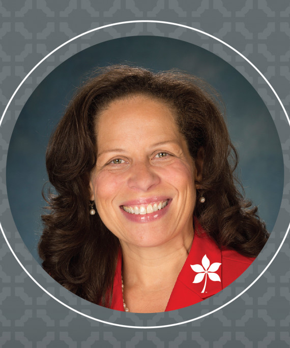 headshot of Karen Beard on OSU patterned gray background