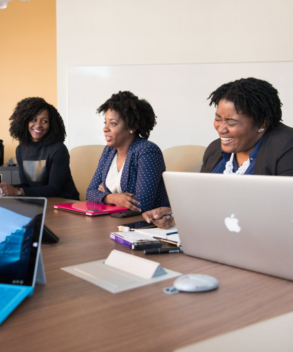 Graduate students working in conference room