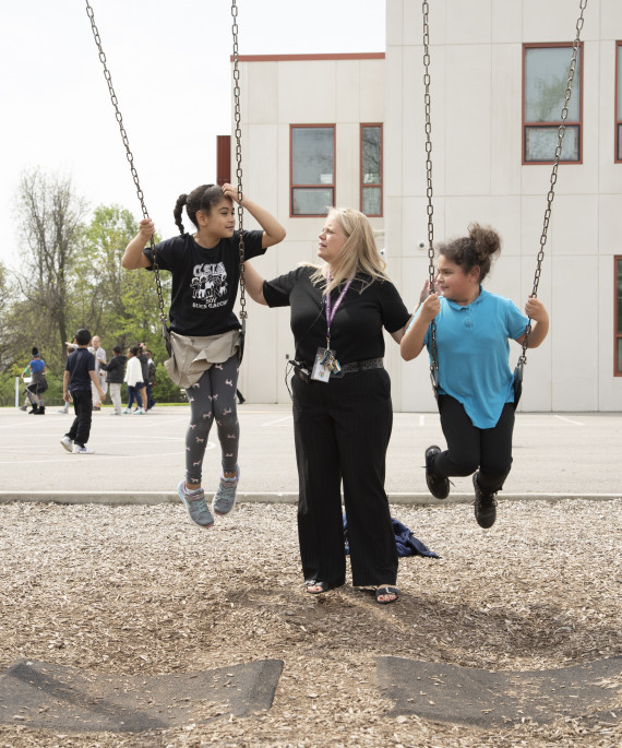 Principal with students outside