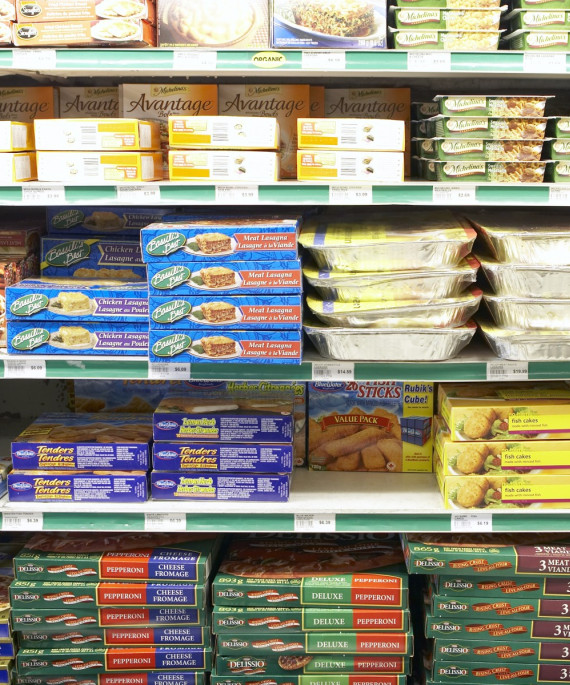 Convinience store shelves full of snack foods