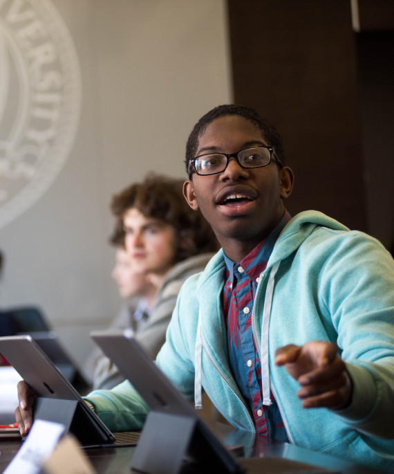 Student in class with tablets