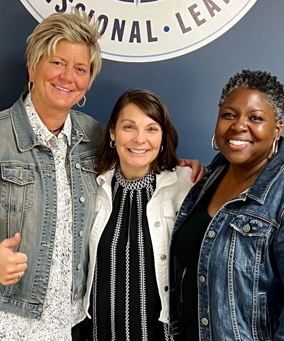 Toya Spencer posing with two other women
